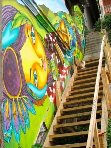 Street art in Valaparaiso, Chile. Cat on colourful staircase.