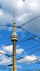 CN Tower amongst Toronto street car wires