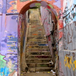 Street art in Valaparaiso, Chile. Graffiti, street art and rubbish consume this staircase.