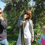 Eating apples at an orchard in Saint Hilaire